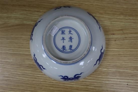 A Chinese Kangxi period blue and white U-shaped jar and cover, height 15cm, together with a Chinese blue and white bowl and a dish